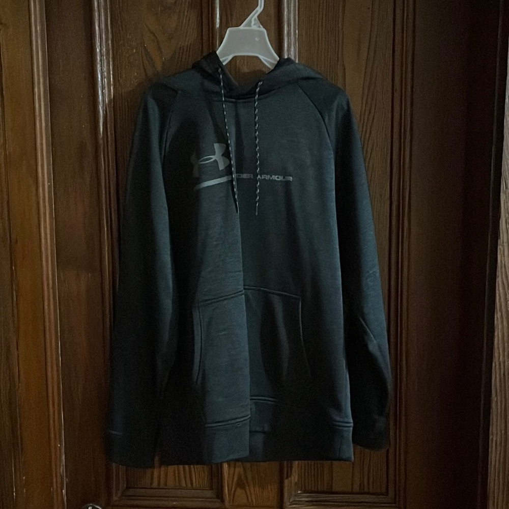 Black Under Armour hoodie.